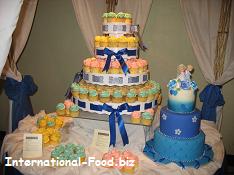 Three-tiered Wedding Cake and Cupcakes with Icing